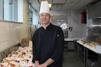 Chef David V. with meals for unhoused londoners